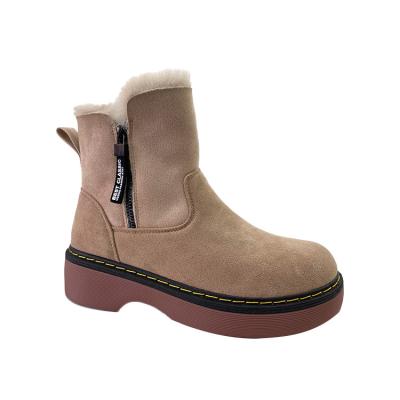 China Autumn Winter Good Wholesale Women Winter Round Boots PU Warm Flat Boots For Ladies for sale