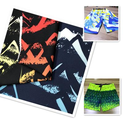 China Stretch high quality 150D woven four way stretch printed 4 stretch fabric for beach pants and swimming wear for sale