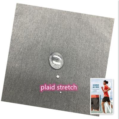 China Stretch 0.1 Plaid 70D 4 Way Woven Ripstop Four Way Stretch Nylon Spandex Fabric For Pants And Sportswear for sale