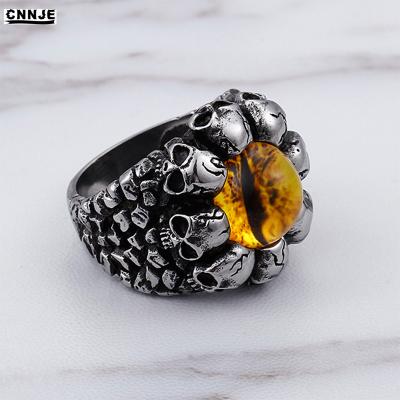 China Trendy Yellow Eye Skull Fashion Ring 316L Stainless Steel Mens Rings Key Jewelry for sale