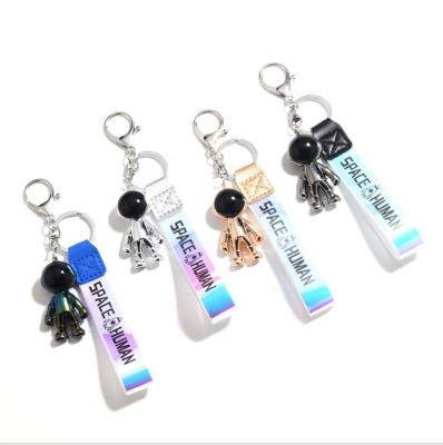 China Keychain Acrylic Keychains Rocket Saturn Alien Pendant Fashion Robot Astronaut Couple Backpack Jewelry Bag Key Chain Car for sale