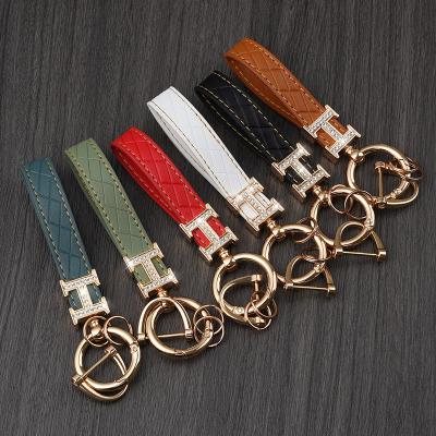 China High End Luxury Genuine Leather Black Key Ring Chain Holder Jewelry Gift Chaveiro Car Buckle Men Women Key Chain Key Ring for sale