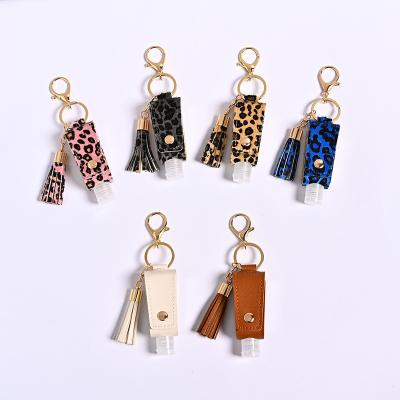 China Hand Sanitizer Key Chain Bottle With Tassel Key Chain 30ML Portable Empty Reusable Bottle PU Leather Key Chains Holder Carriers for sale