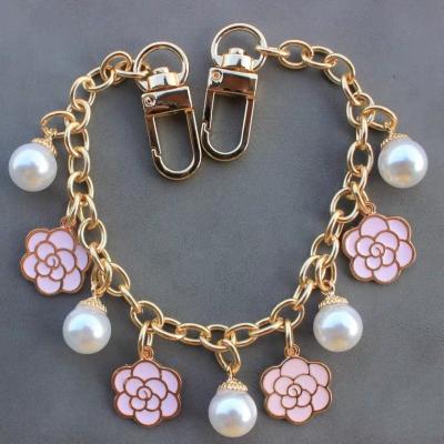 China New Flower Pearl Metal Stud Bag Chain Bag Key Chain for sale