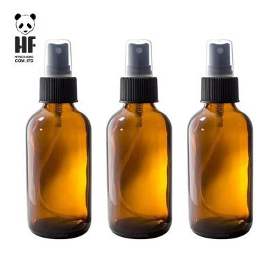 China Hot Round 4Oz 8Oz 16Oz Boston Personal Care Amber 2 Spray Glass Spray Bottle With Fine-Mist Black Sprayer for sale