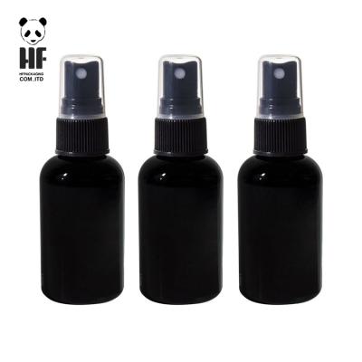 China Wholesale 2oz Matte Black Personal Care Essential Oil Perfume Glass Spray Bottle With Spray Cap for sale