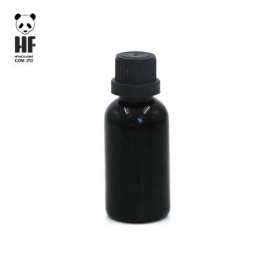 China Wholesale Empty Matte Black 100ml Personal Care Essential Oil Glass Bottle With Cap for sale