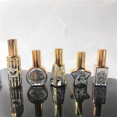 China 2021New Cosmetic Luxury Perfume Bottle Spray With Lid Unique Perfume Bottles With Cap for sale