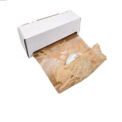 China Recycled Biodegradable Materials Honeycomb Kraft Paper Honeycomb Cushioning Wrap Roll Packaging for sale