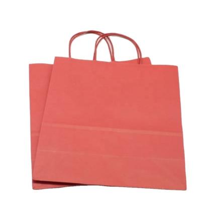 China Recycled Materials Wholesale Printed Portable Gift Bags Universal Kraft Paper Bag Packing Handbag for sale