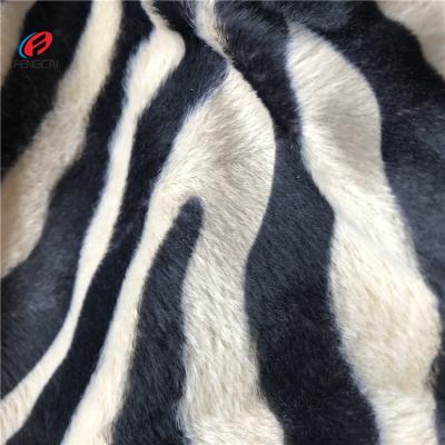 China Good Quality Anti-static China Produced 0.5-4mm Ultra Short Soft Pile Fabric Polyester Animal Printed Fabric for sale