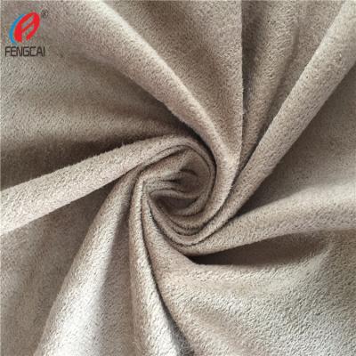 China Antistatic High End Animal Tan Snakeskin Transfer Printed Suede Fabric For Jackets for sale