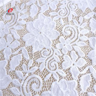 China Different design anti-static wrap knitted flower mesh lace fabric encaje fabric for bra underwear for sale