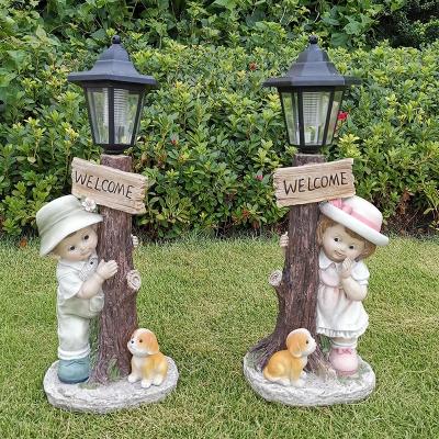 China Outdoor Solar Light Decoration Contemporary Home LED Stock Resin Nursery Garden Ornaments Plaque Child Statues Figurine for sale