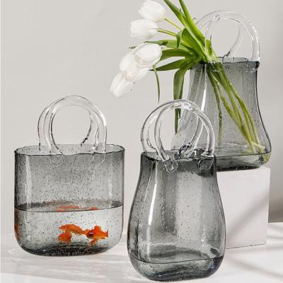 China New Design Vintage Luxury Home Decor Bubble Aquarium Vase Flower Vases Handbag Shaped Glass Mini Greenhouse Decoration for sale