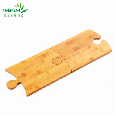 China Sustainable Party or Picnic Puzzle Bamboo Paddle Cutting Board with Wine Rack for sale