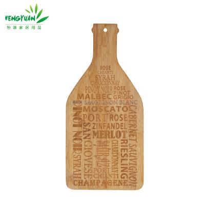 China Custom Sustainable Label Bottle Shape Bamboo Bread Cutting Board With Logo for sale