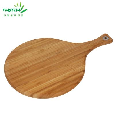 China Sustainable Hot Turn Bamboo Pizza Cutting Board With Handle for sale