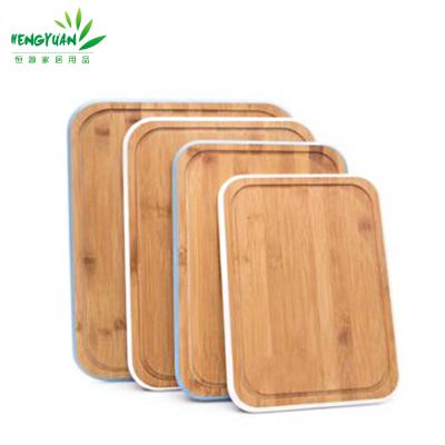 China Viable Colored Side 3 Piece Bamboo Cutter Chopper Set With Groove for sale