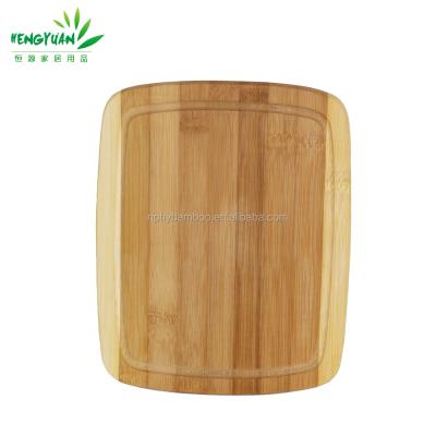 China Sustainable bamboo cutting board custom cutting board with groove for sale