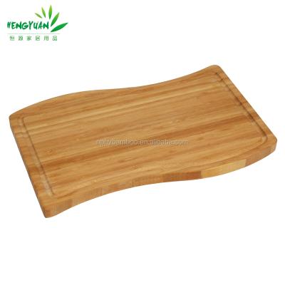 China Sustainable Kitchenware Fun Shape Bamboo Cutting Board With Groove for sale