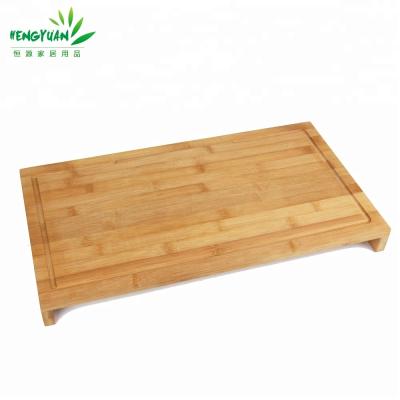 China Sustainable bamboo cookware above sink cutting cutting board with grooves for sale