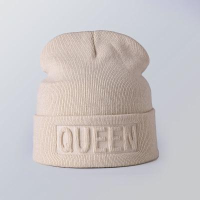 China COMMON Wholesale Warm Winter Fashion High Quality Hats Style Acrylic Yarn Winter Knit Leather Women Beanie Hats For Men And Patch Hat for sale