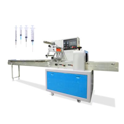 China Medical Food Product Packing High Speed ​​Fully Automatic Disposable Syringe Packaging Machine for sale