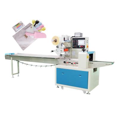 China Horizontal Automatic Disposable Food Packing Machine Cake Tableware Packaging Machine for sale