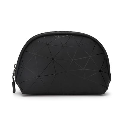 China Hot Sale Fashion Geometric Black Cosmetic Bag Custom Leather Makeup Bag Travel With Zipper for sale