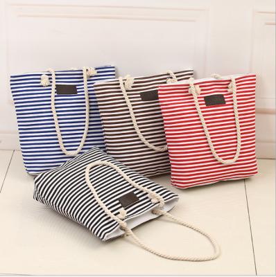 China Simple Ladies Handled Striped Canvas Beach Bag Canvas College Style Rope Shoulder Tote Bag With Zipper for sale