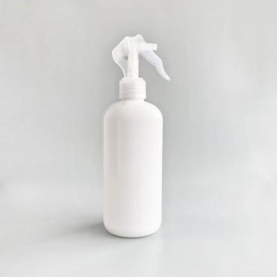 China Cosmetic Bottle 200ml 300ml 300ml 400ml 500ml Wholesale Plastic Round Flat PET Bottle With Trigger Spray Pump For Clean The Kitchen Room for sale