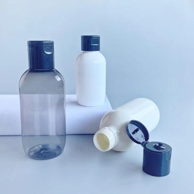 China PET Cosmetic Empty Round Round Bottle 50ml 100ml 150ml Plastic Flip Top PP Cover Empty Plastic Bottle for sale