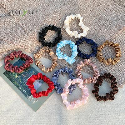 China Custom 100% Silk Bulk Hair Scrunchies 100% Silk Hair Scrunchies Fashion Logo Small Manufacturing Skinny 1cm Hair Stand for sale