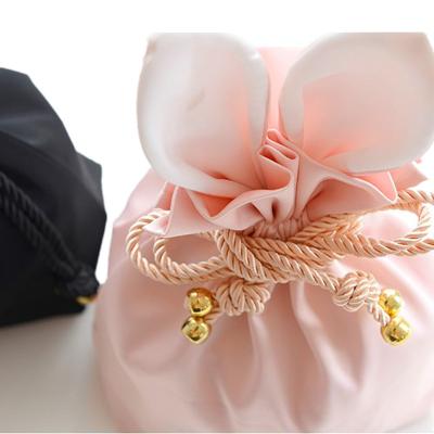 China Natural In Stock Rabbit Ear Wholesale 100 Drawstring Bags Silk Custom Party Wedding Gift Bags Beautiful for sale