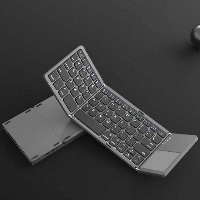 China Mini Portable Triple Folding Wireless Wireless Keyboard for Windows Android IOS Tablet Smart Phone for sale