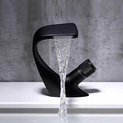 China Luxury Black Brass Basin Faucet Single Metered Single Metered Waterfall Design Bathroom Hot And Cold Water Mixer Sink Faucet for sale