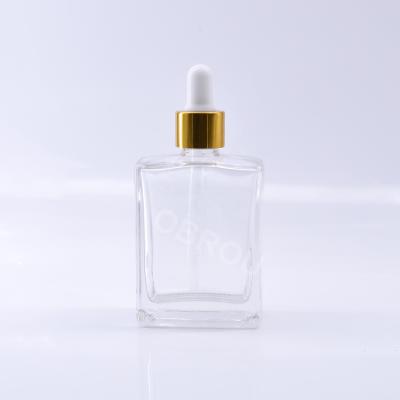 China Non-Toxic High End Custom Flat Square Obrou Glass Dropper Bottle Glass Perfume Bottle for sale