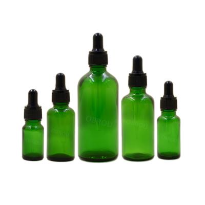 China Luxury Green Glass Personal Care Bottle 10ml 20ml 30ml 50ml 100ml Amber Blue Clear Perfume Empty Glass Bottle With Screw Cap Cap for sale