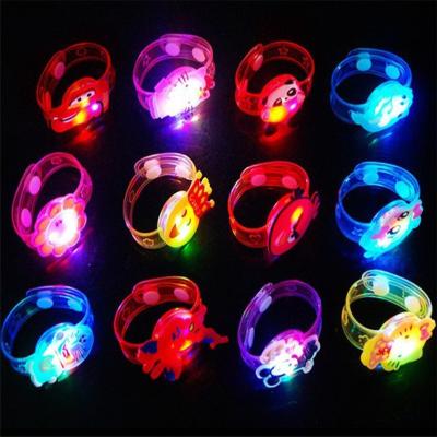 China Flashing Luminous Bracelet Watch Different Styles Cartoon Small Toys Kids Gifts for sale