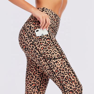 China Breathable Custom Made GYM Private Label Workout GYM Butt Lift Pocket Cheetah High Print Women Yoga Gaiters Pants for sale