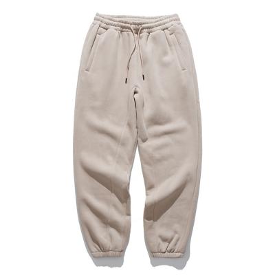 China Fashion Sale Mens Sweatpants Custom Warm Breathable Solid Color Tight Leg Opening Pulser Pants Outdoor Casual Sweatpants For Men for sale