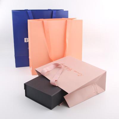 China Recyclable Sexy Coated Paper Products Recyclable Coated Paper Sexy Lingerie Sleepwear Retail Skin Care Perfume Gift T-shirt Promotion Fashion Packaging Bags for sale