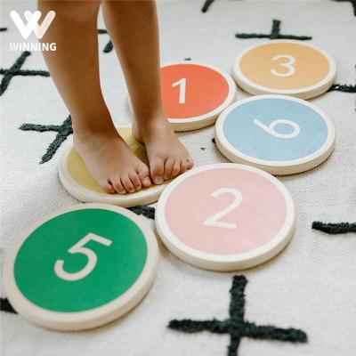 China Customized Eco-Friendly Material Gain Colored Wooden Hop And Balance Montessori Step Stones Stepping Stones Logo Shape Color Size Mini 6 for sale