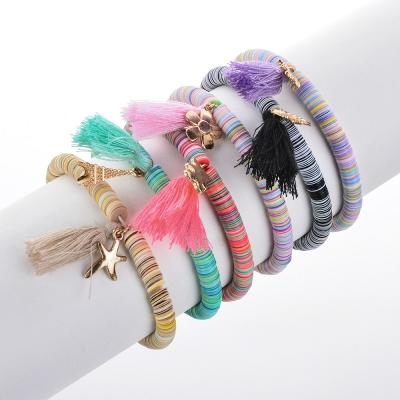 China FASHIONABLE Saling Bohemia Alloy Tassel Bear Hot Colorful Pendant Woven Bracelets Rainbow Resin Handmade Braided Bracelet For Women for sale