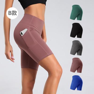 China 2020 Summer Breathable Phone Bilateral Pockets Sweat Wicking High Waist Spandex Women Fitness Nylon Biker Shorts for sale