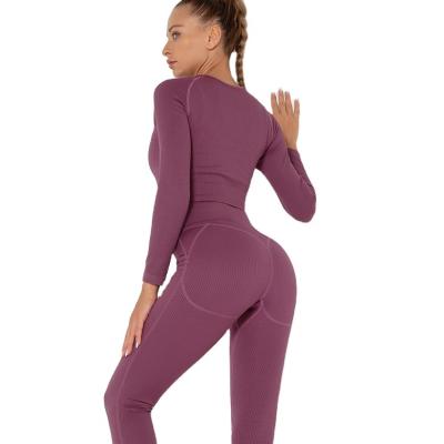 China OEM/ODM Customization Breathable Sports Yoga Apparel Gym Workout Seamless Fitness Wear High Waisted Yoga Sets Leggings For Women for sale