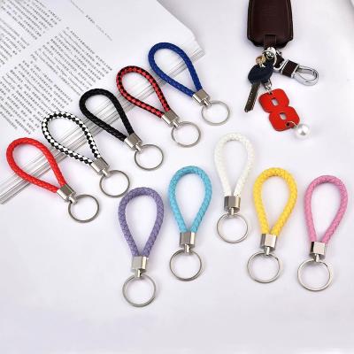 China - New Product Soft Braided PU Leather Key Chain Silicone Key Chain Colorful Leather Ring Key Chains for sale