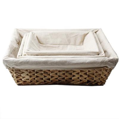 China Vintage Four-Piece Set Simple And Lined Universal Water Hyacinth Basket Straw Woven Basket Storage Basket for sale