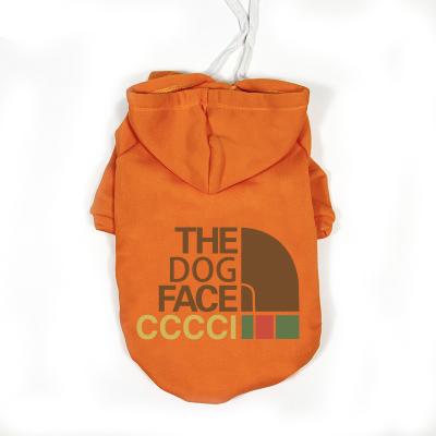 China Stocked Luxury Polyester Stock Fleece Pet Clothes The Dog Face Logo Printing Cat And Dog Fashion Clothes for sale